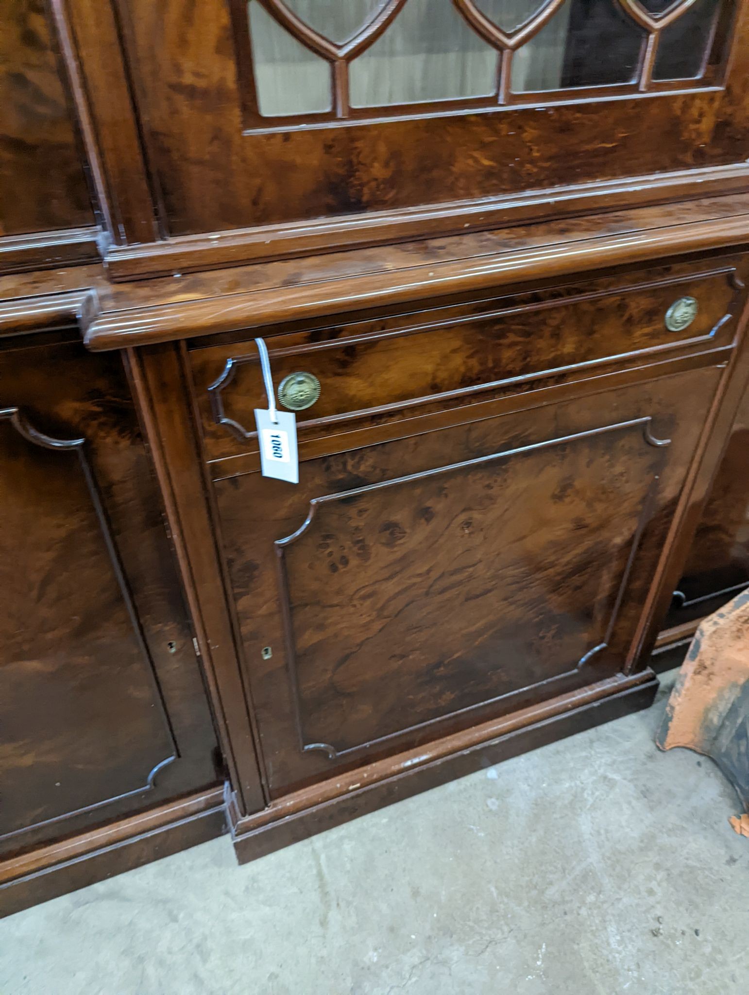 A Victorian style walnut breakfront library bookcase, length 168cm, depth 46cm, height 219cm